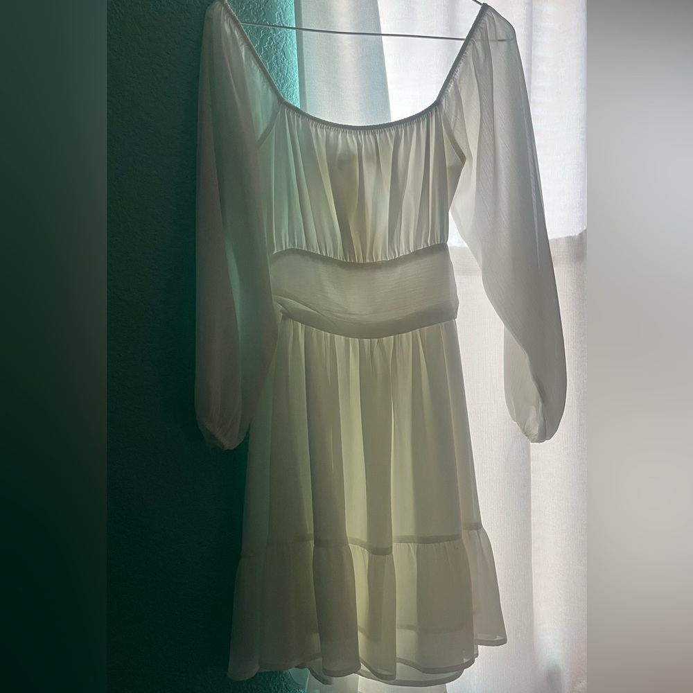 White dress with bow on back